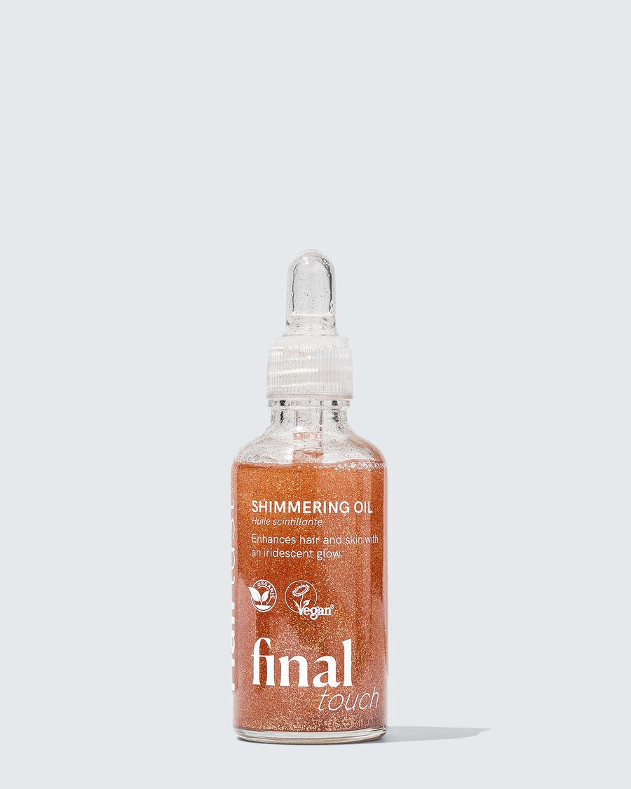 Flaske med Final Touch Shimmering Oil fra Hairlust