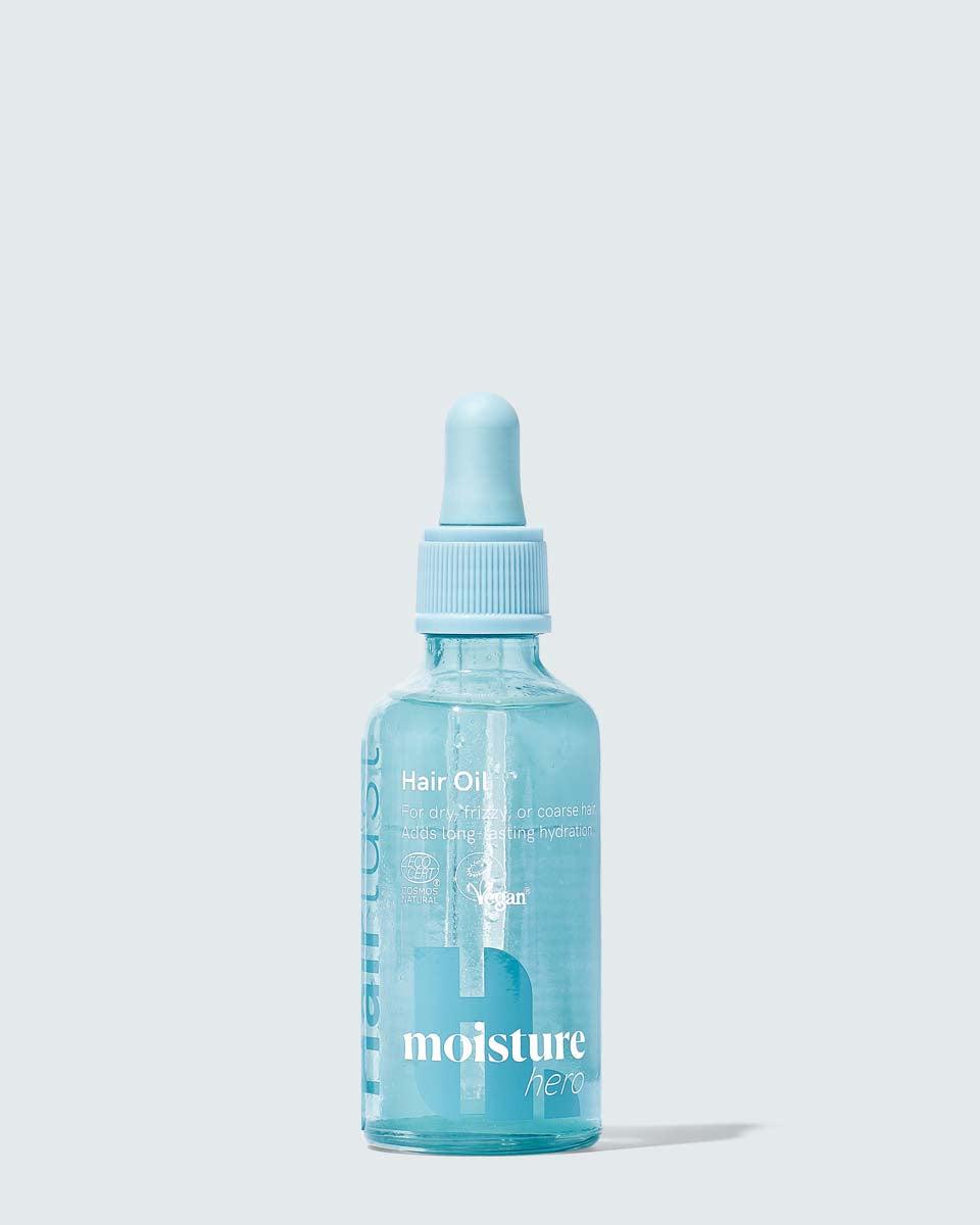 Flaske med Moisture Hero Hair Oil fra Hairlust
